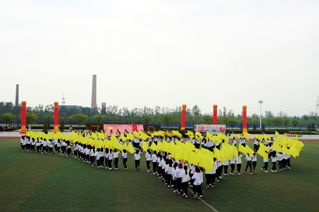 活力青年强国,演绎完满信院——我校第十二届春季田径运动会隆重开幕